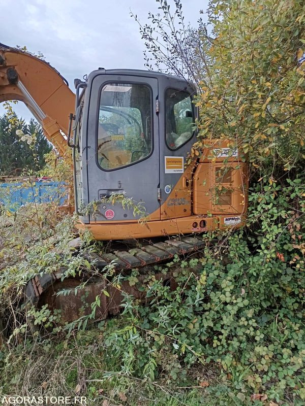 Pelle Case CX 135 SR 2015 7000 heures avec bras deporté et 3 godets - Excavator: picture 2 Pelle Case CX 135 SR 2015 7000 heures avec bras deporté et 3 godets - Excavator: picture 2