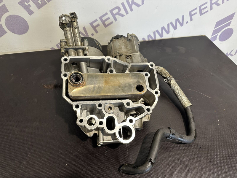 MAN oil filter housing with coolant - Engine and parts for Truck: picture 1 MAN oil filter housing with coolant - Engine and parts for Truck: picture 1