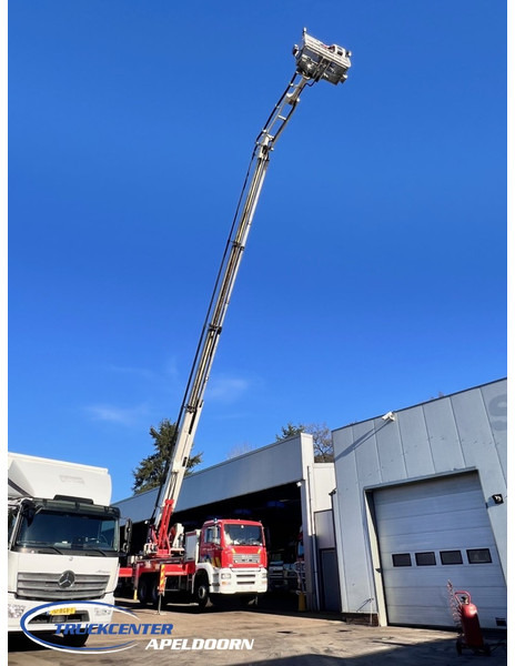 MAN TGA 26.350 Magirus ALP 320L = 32 meter, Waterpump, 6x4, Steel springs - Fire truck: picture 1 MAN TGA 26.350 Magirus ALP 320L = 32 meter, Waterpump, 6x4, Steel springs - Fire truck: picture 1
