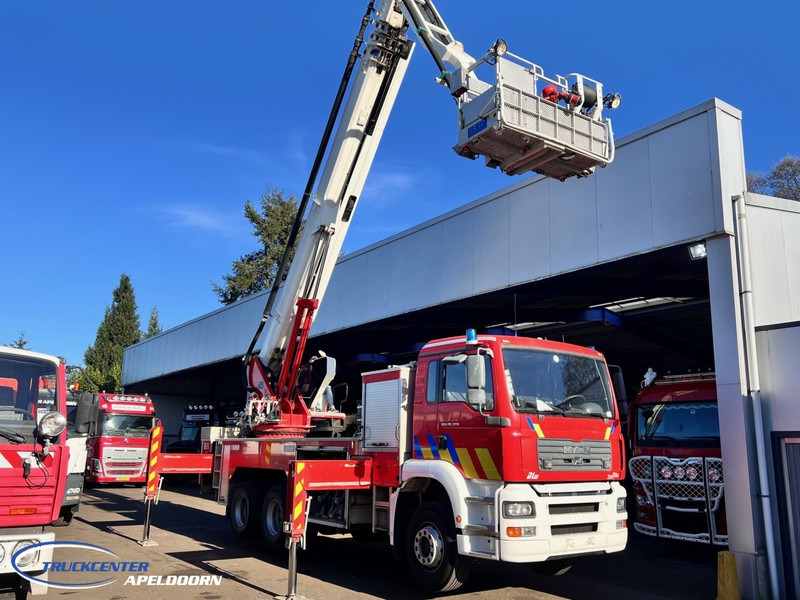 MAN TGA 26.350 Magirus ALP 320L = 32 meter, Waterpump, 6x4, Steel springs - Fire truck: picture 2 MAN TGA 26.350 Magirus ALP 320L = 32 meter, Waterpump, 6x4, Steel springs - Fire truck: picture 2