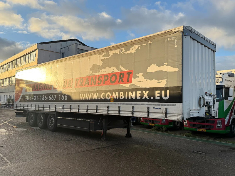 Krone SD - 3 AXLE - DISC BRAKES + SLIDING ROOF - Curtainsider semi-trailer: picture 1 Krone SD - 3 AXLE - DISC BRAKES + SLIDING ROOF - Curtainsider semi-trailer: picture 1