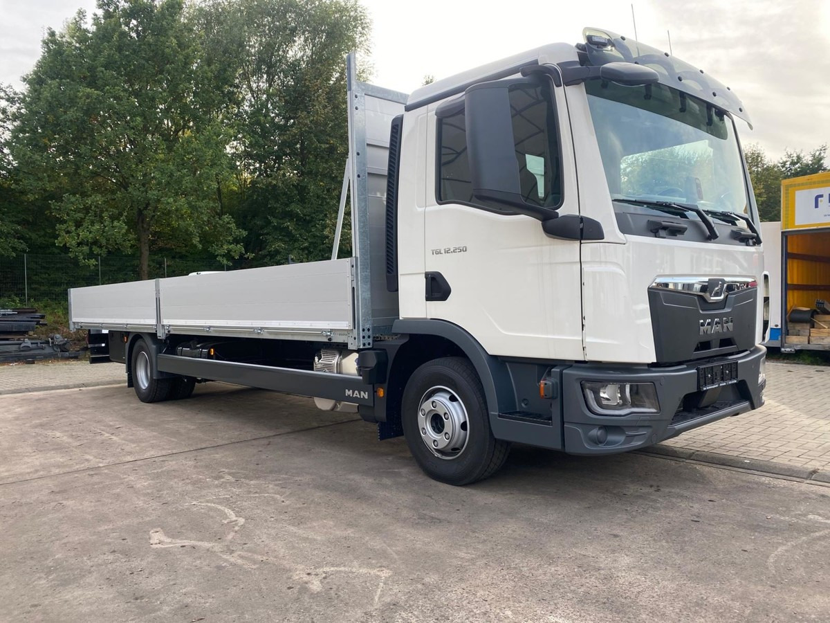 MAN 12.250 BL Gerüstbaupritsche 2x AHK - Dropside/ Flatbed truck: picture 2 MAN 12.250 BL Gerüstbaupritsche 2x AHK - Dropside/ Flatbed truck: picture 2