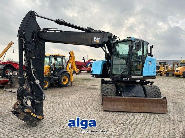 Caterpillar M315F, OilQuick, Hammer- u- Greifersteuerung - Wheel excavator: picture 1 Caterpillar M315F, OilQuick, Hammer- u- Greifersteuerung - Wheel excavator: picture 1