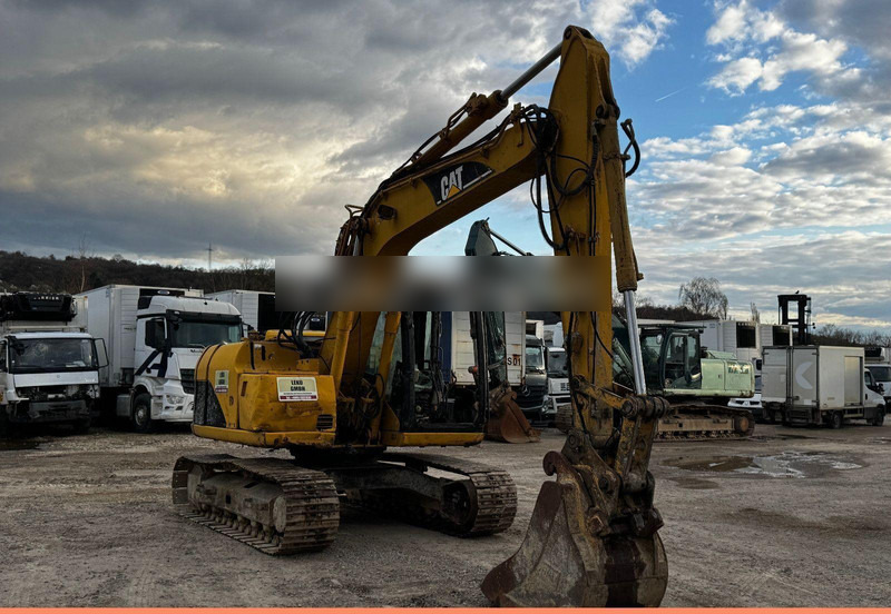 Caterpillar 311C Mit Zwei Löffeln - Crawler excavator: picture 1 Caterpillar 311C Mit Zwei Löffeln - Crawler excavator: picture 1