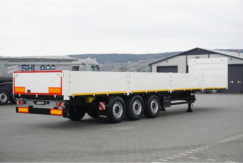 Kögel BURTOWA / BUDOWLANA / OŚ PODNOSZONA - Dropside/ Flatbed semi-trailer: picture 5 Kögel BURTOWA / BUDOWLANA / OŚ PODNOSZONA - Dropside/ Flatbed semi-trailer: picture 5