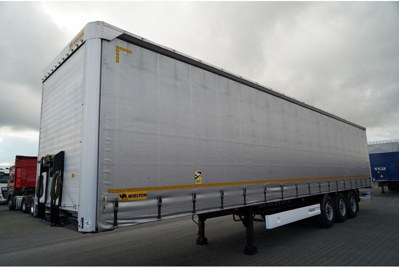 Wielton FIRANKA / STANDARD / OŚ PODNOSZONA / PLANDEKA ZBROJONA - Curtainsider semi-trailer: picture 4 Wielton FIRANKA / STANDARD / OŚ PODNOSZONA / PLANDEKA ZBROJONA - Curtainsider semi-trailer: picture 4