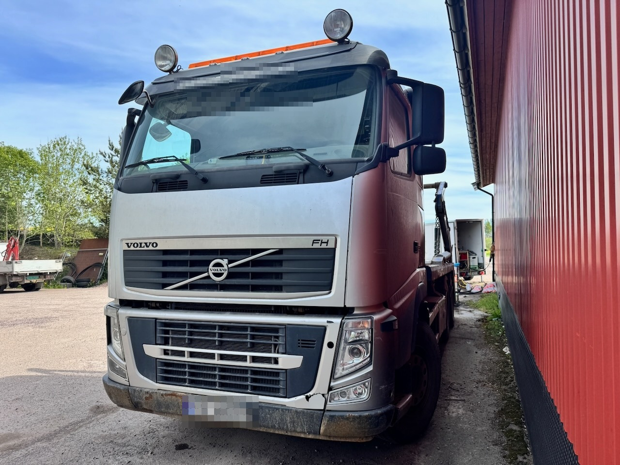 Skip loader truck Volvo FH520: picture 6