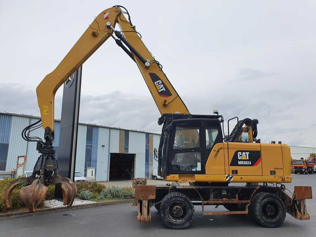CAT MH3024 / MH 3024 / inkl. Greifer / 2018 / 9.424h - Wheel excavator: picture 3 CAT MH3024 / MH 3024 / inkl. Greifer / 2018 / 9.424h - Wheel excavator: picture 3