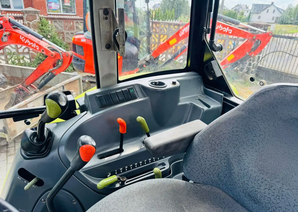 Farm tractor Claas Axos 330: picture 12