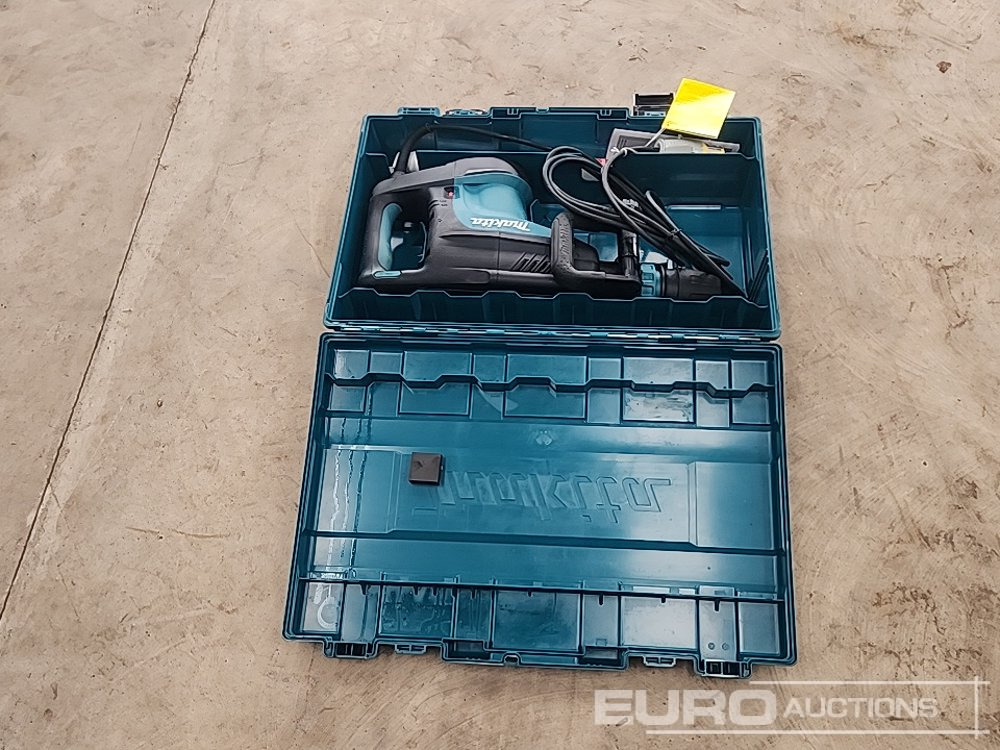 Unused Makita HM1203C Demolition Hammer 110V - Construction equipment: picture 4 Unused Makita HM1203C Demolition Hammer 110V - Construction equipment: picture 4