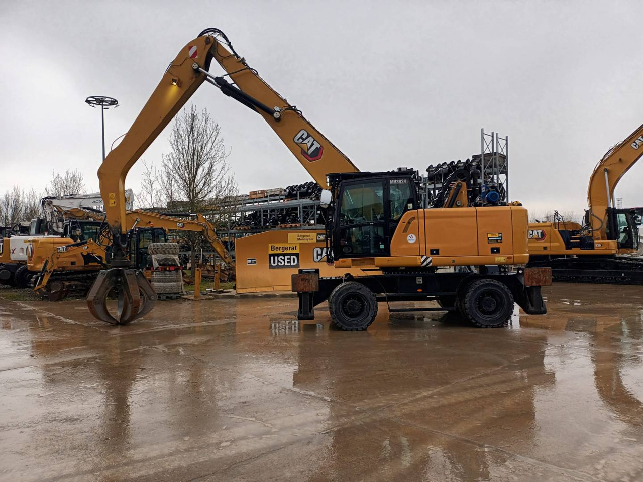 CAT MH3024-1 - Wheel excavator: picture 1 CAT MH3024-1 - Wheel excavator: picture 1