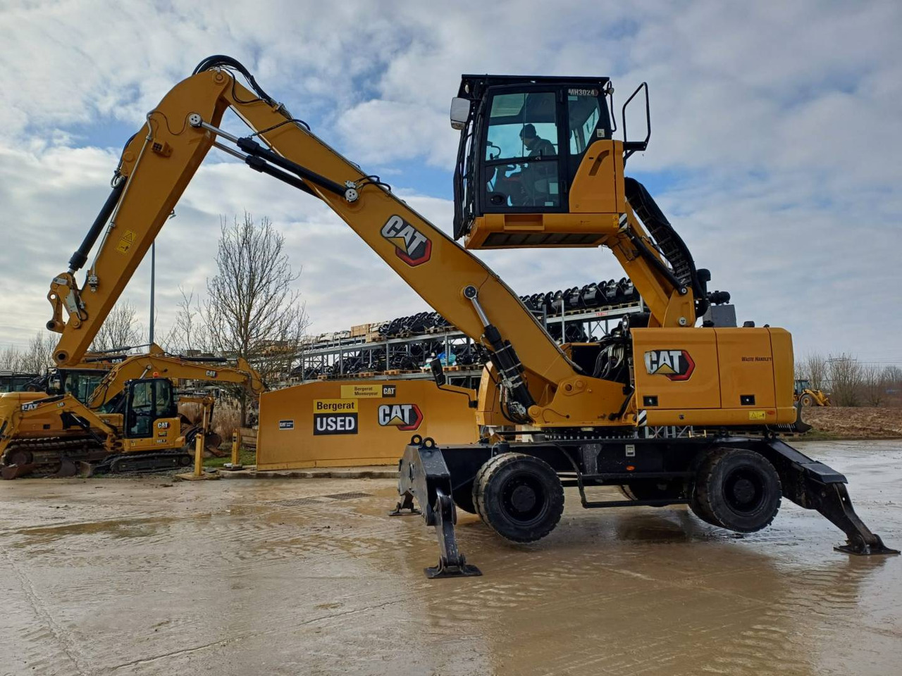 CAT MH3024 - Wheel excavator: picture 1 CAT MH3024 - Wheel excavator: picture 1