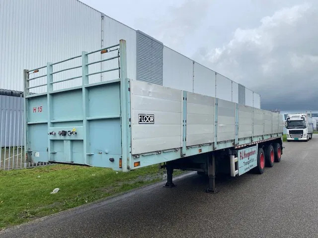 Floor stenenoplegger, 3 asser uitschuifbaar met stuuras en liftas - Dropside/ Flatbed semi-trailer: picture 1 Floor stenenoplegger, 3 asser uitschuifbaar met stuuras en liftas - Dropside/ Flatbed semi-trailer: picture 1